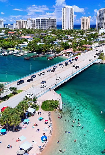 Aerial Water View of Hotel by Bridge_edited.jpg