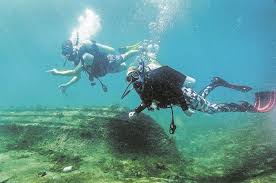 Divers at Blue Heron Bridge