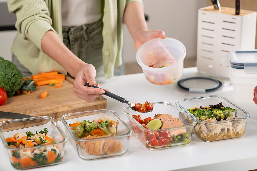 Close-up of a colorful meal prep container with balanced portions of protein, vegetables, and grains