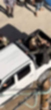 Aerial view of a Hamas truck with Israeli hostages and bodies in the back
