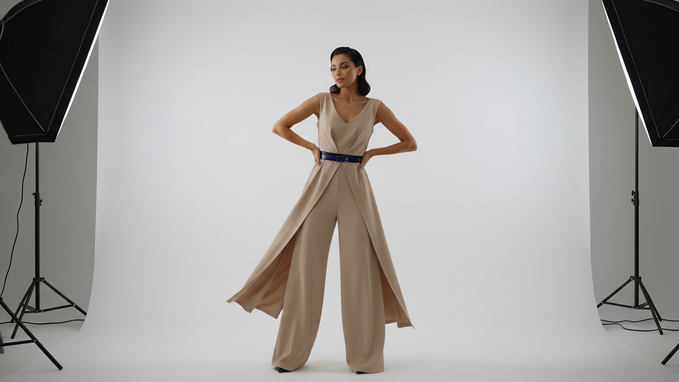 Eye-level view of a model posing confidently in a studio