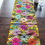 Thumbnail: Table runner with Flowers  in a Ocher tone and multicolor embroidered 