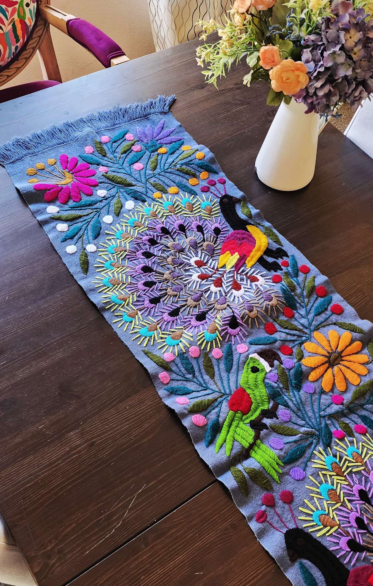 Table Runner with Peacocks blue-gray, hand embroidered and multicolor flowers.