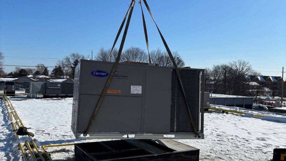 Winter rooftop unit replacements by crane (main photo)