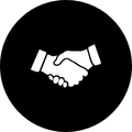 A handshake between two people, symbolizing a partnership.