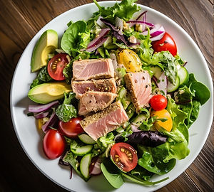 Tuna salad served on a bed of mixed greens