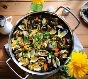 Clam bake including mussels, clams, and sautéed zucchini