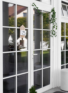 decorated-front-door-with-plant.jpg