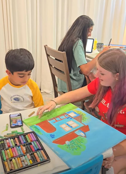 A child painting in an art class at Art for Heart, developing creativity and future-ready skills in the age of artificial intelligence