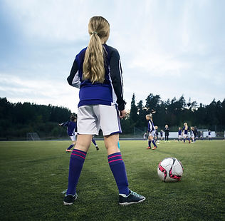 Rearview of a Girl Soccer Player