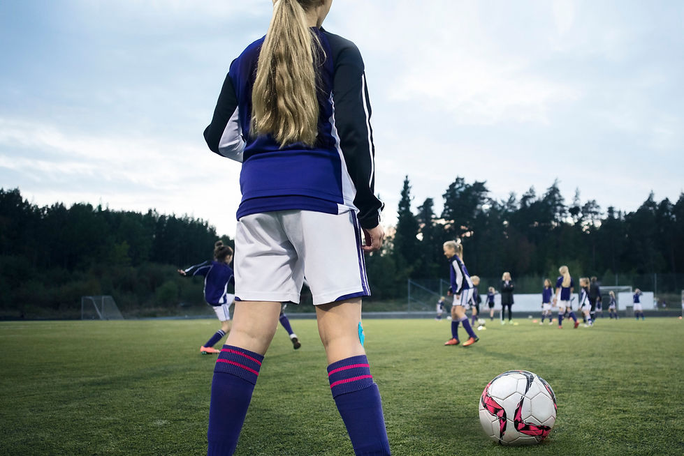 Rearview of a Girl Soccer Player