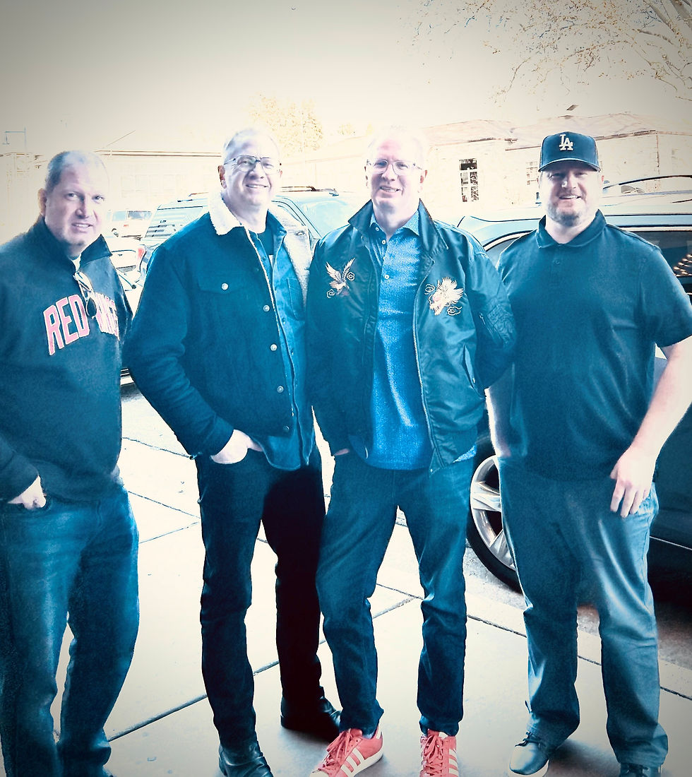 Dec 2024. Scott and Eric in middle with other brothers on the outsides. Eric wears the red shoes.