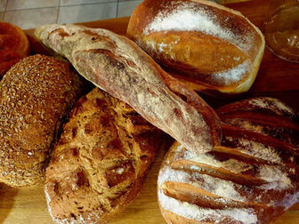 Fresh bakes breads in a pile