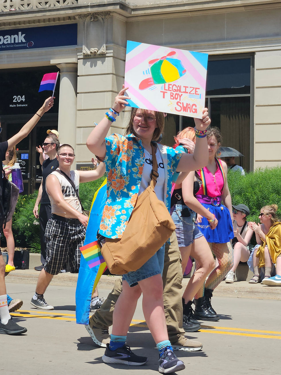 Citizens participating in the 2025 Iowa City Pride Parade; photo by Lili Nandell