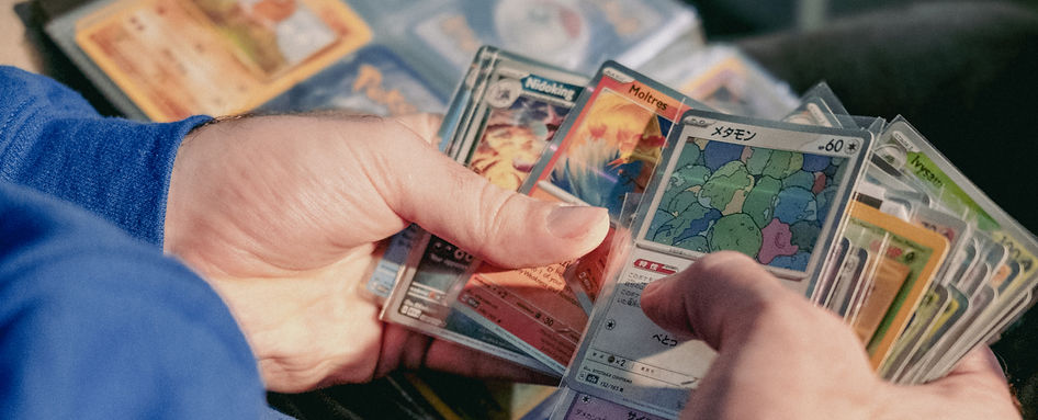 Holding Pokemon Cards