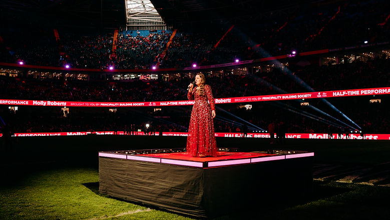 Molly Roberts performing at Six Nations match, Principality Stadium, Wales vs France, 2026