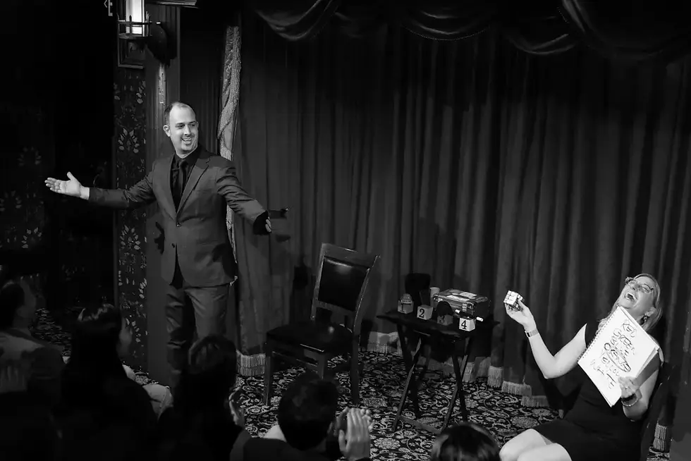 Corporate Mentalist Bryan Miles On Stage Lady Laughing