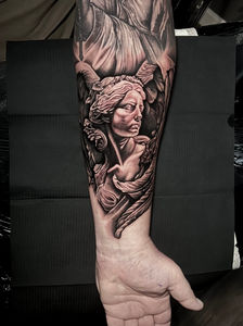 tatouage d'ange sculpté