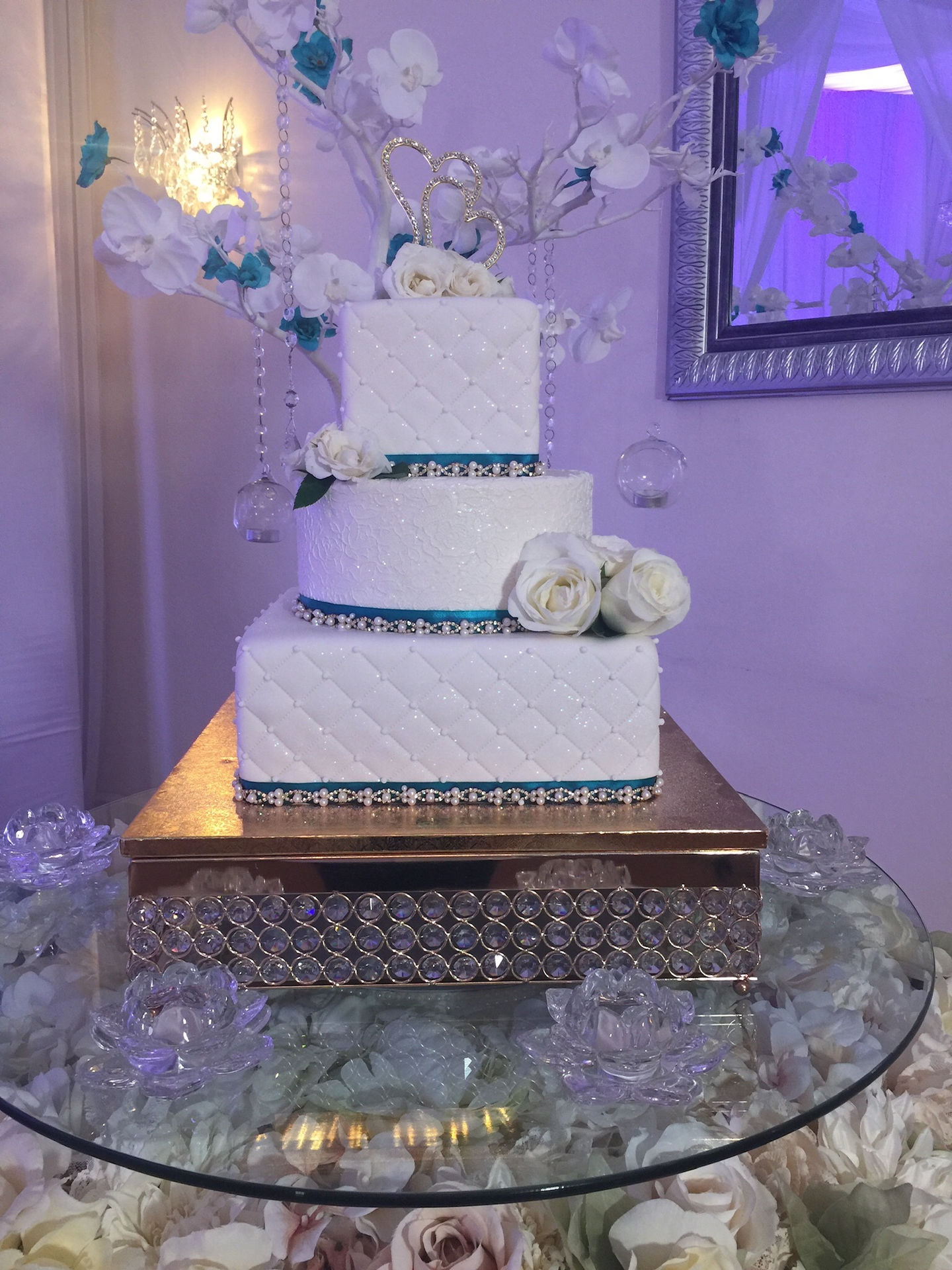 Turquoise and white cake.jpeg