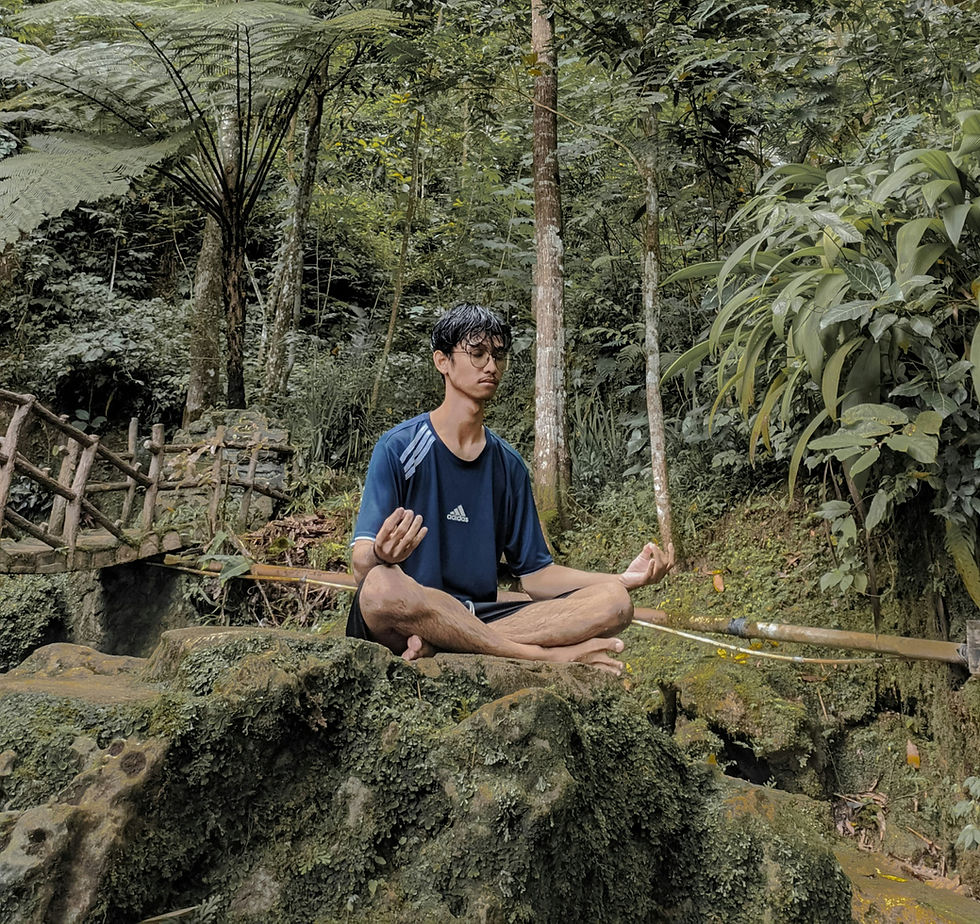 Person meditating outside