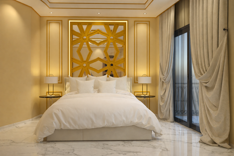 Luxury master bedroom interior design featuring a custom geometric headboard, warm lighting, and neutral materials.