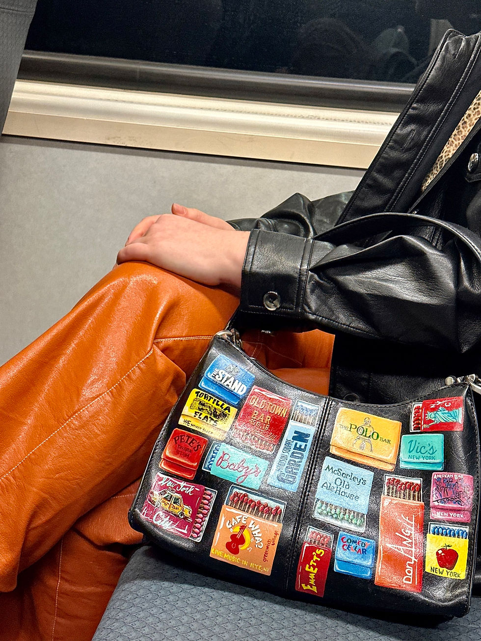 Bold hand painted leather purse featuring iconic NYC venues of matchboxes. Showcasing colorful and trendy matchbook art. Sale