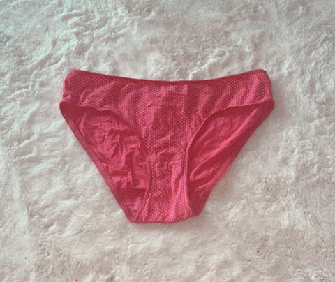 Culotte rose à pois blanc