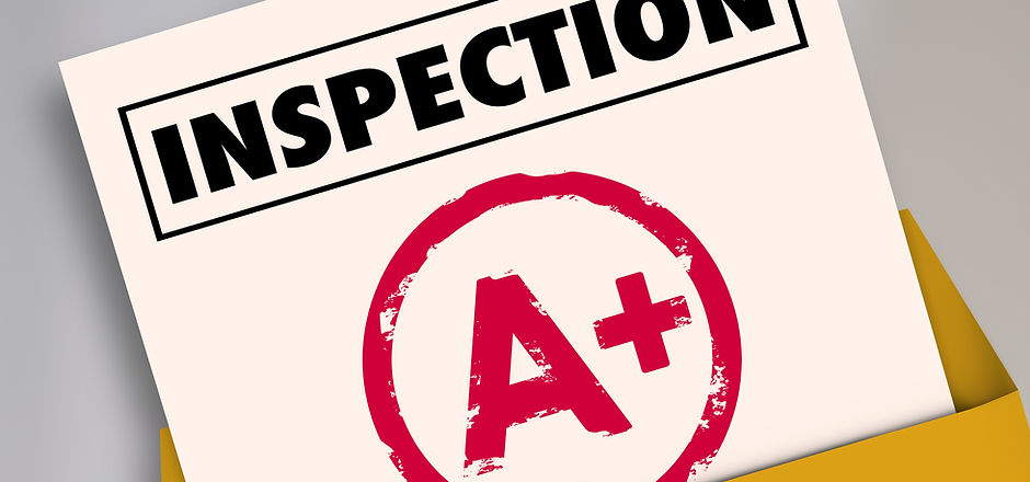 Inspection report card with an A Plus grade or score for an excellent review or evaluation.jpg