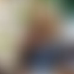 Woman calmly thinking about her budget at home in a relaxed environment