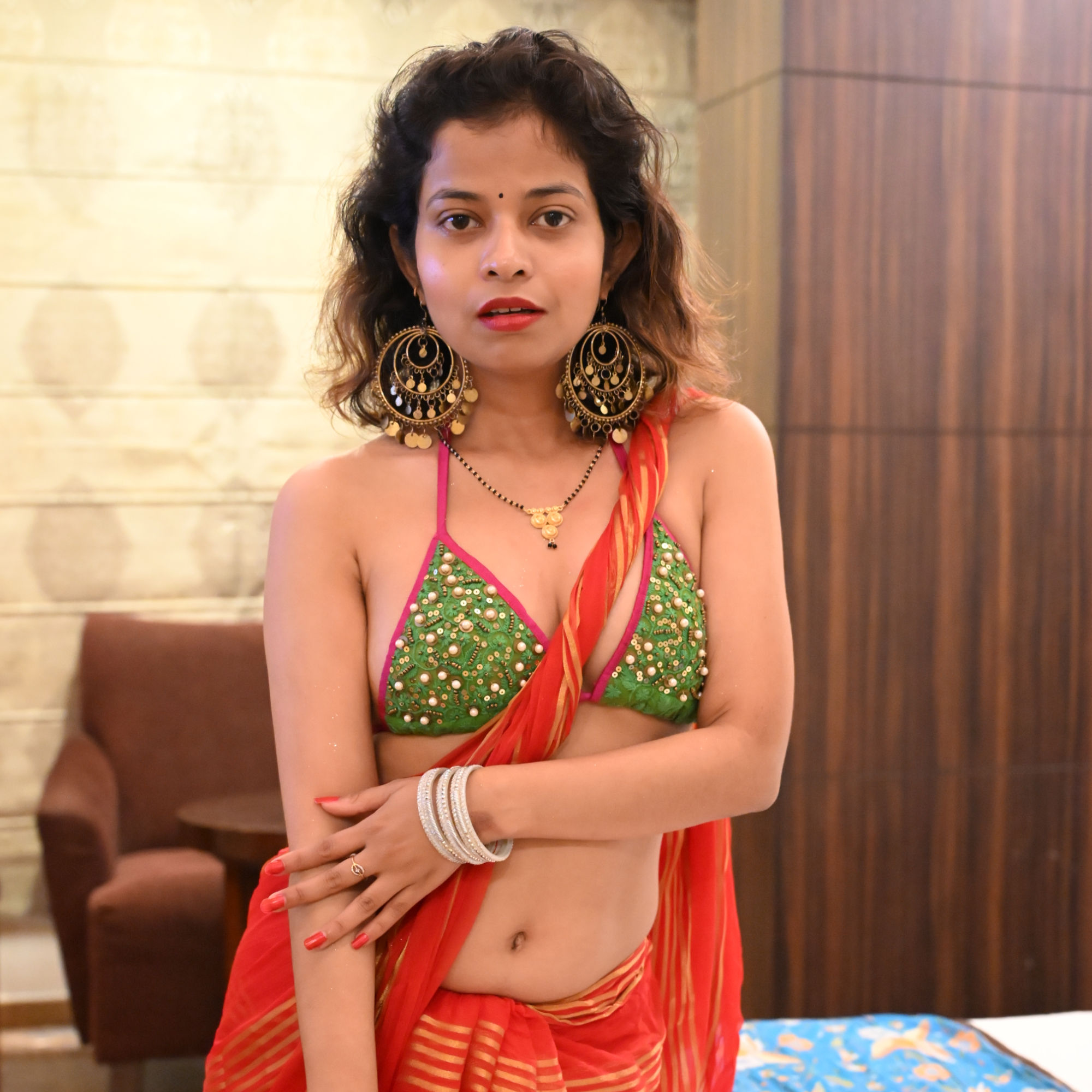 Handmade Designer Bikini Blouse in Embroidered Net & Moti Embellishment.