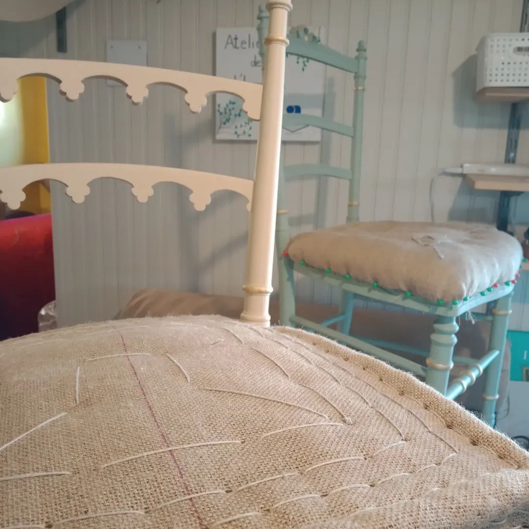 Step in the stitching of a traditional upholstered chair