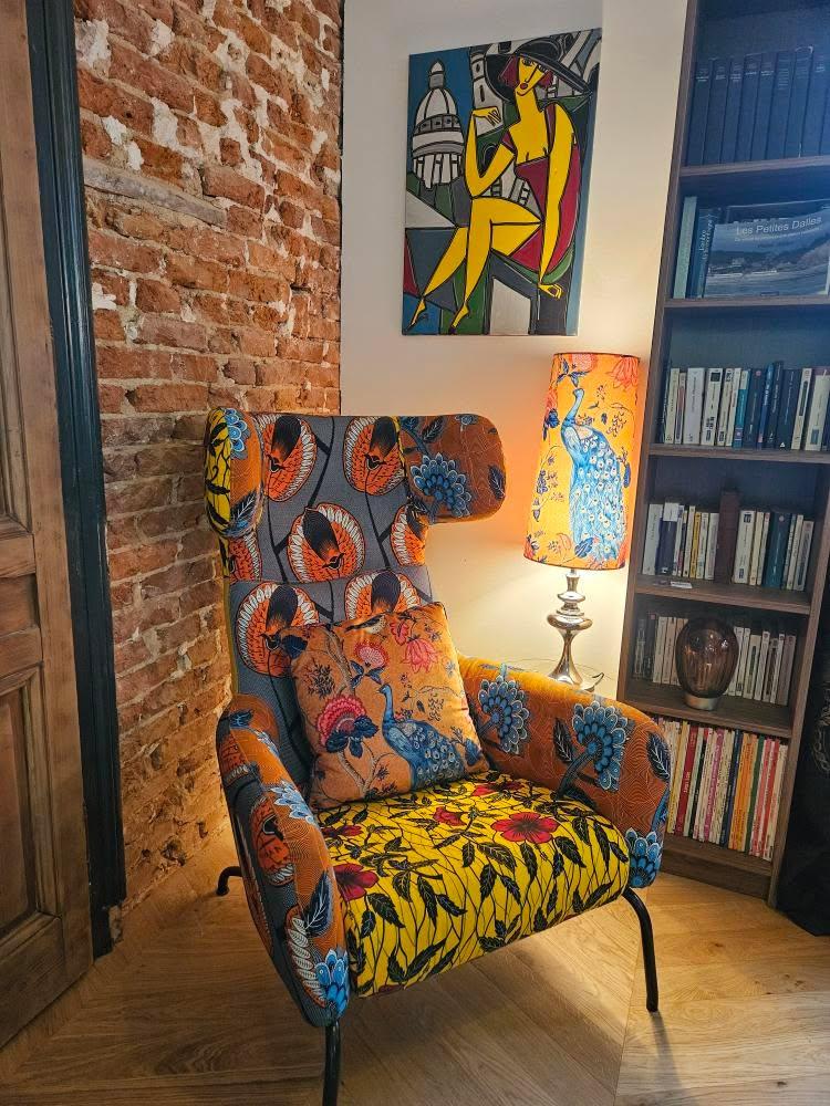 Restored armchair and bespoke lighting for Villa du Clos Normand