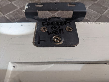 cabinet door in poor prior condition before painting