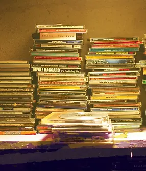 FWL P90s pile of CDs.webp