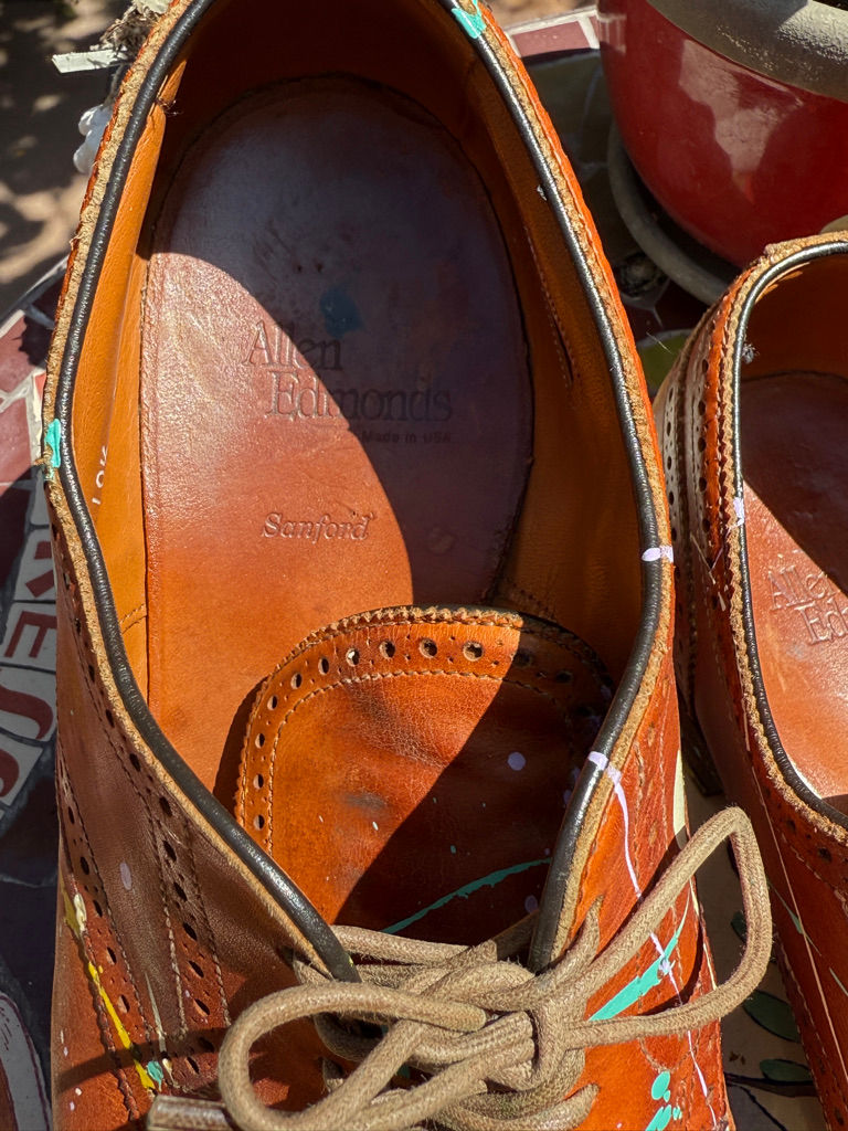 Thumbnail: Detail of painted leather surface with layered pigment and texture