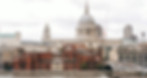 London cityscape: St. Paul's Cathedral, river, barges, and people near banners