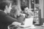 Team brainstorming, laptops, tablets
