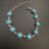 Miniatura: Pulseira redonda esferas turquesas aço 