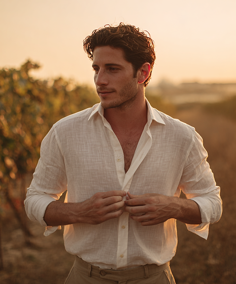 u1977688691_a_realistic_photo_of_a_groom_standing_in_a_vineya_e07749af-d564-4be1-9b48-9063