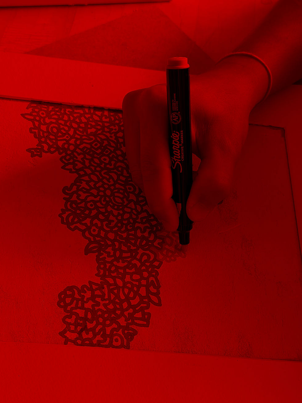 Turning unexpected everyday materials into a bold Doodlism artwork with Sharpie.