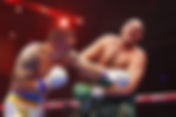 Oleksandr Usyk Nearly Knocks Out Tyson Fury, Captures Heavyweight Titles in Instant Classic