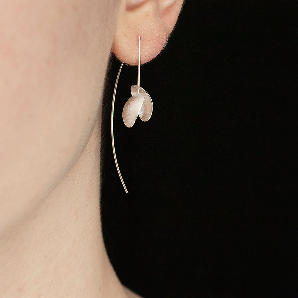 Double Seed Drop Earrings on Ear