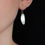 Thumbnail: Olive Leaf Drop Earrings on Ear