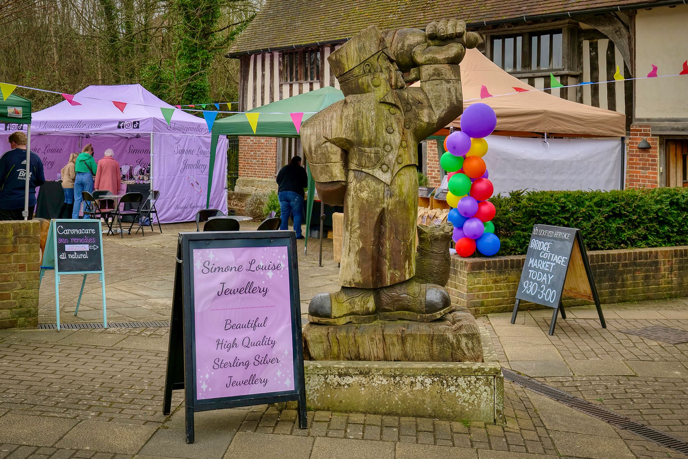 Wooden figure at Bridge Cottage Market, Simone Louise Jewellery, 9:30-3:00