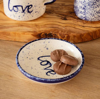 Mediterranean soul: The 'Wave' range features hand-painted ceramics that capture the fluid beauty of