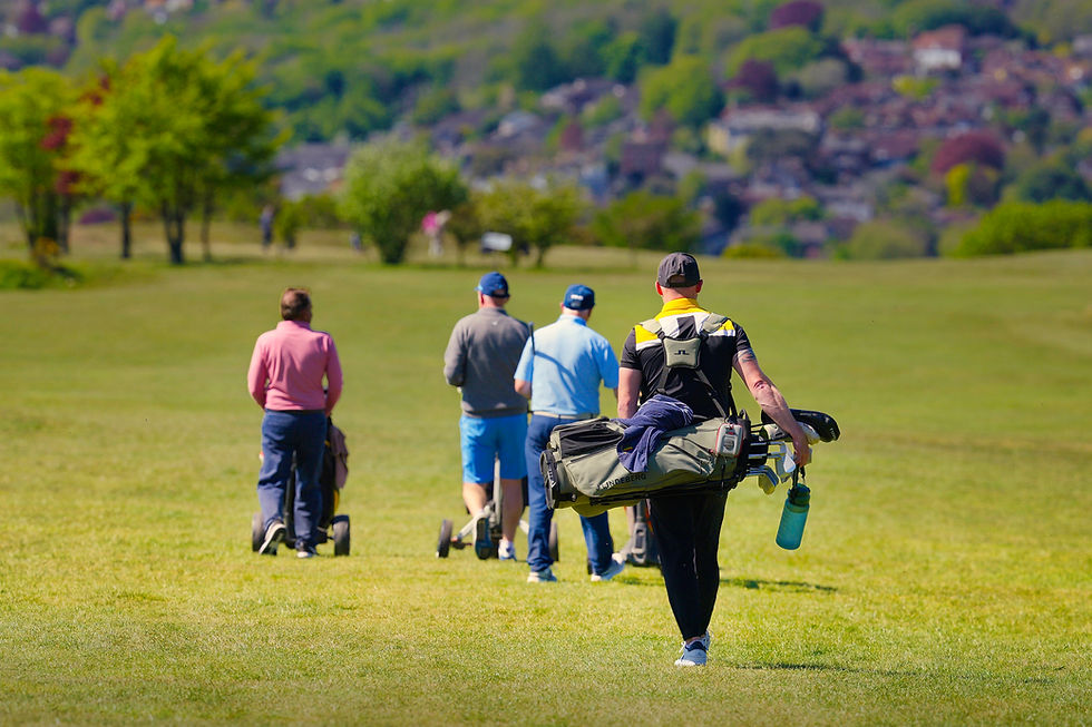 Pro Am Team crossing the fairways at LGC by WATTSTUDIO April 2026