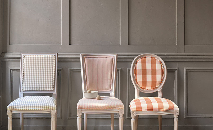Three chairs with gingham fabric