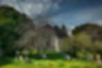 Ancient stone church, graveyard, spring