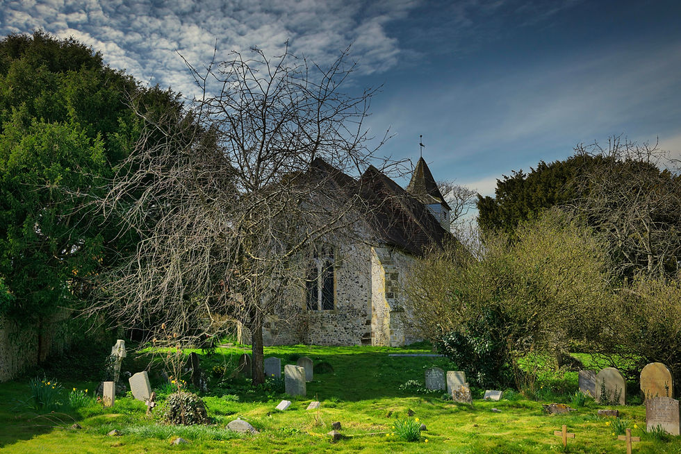 Ancient stone church, graveyard, spring