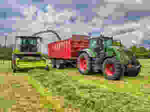Forage Harvester unloading into a tractor and trailer.